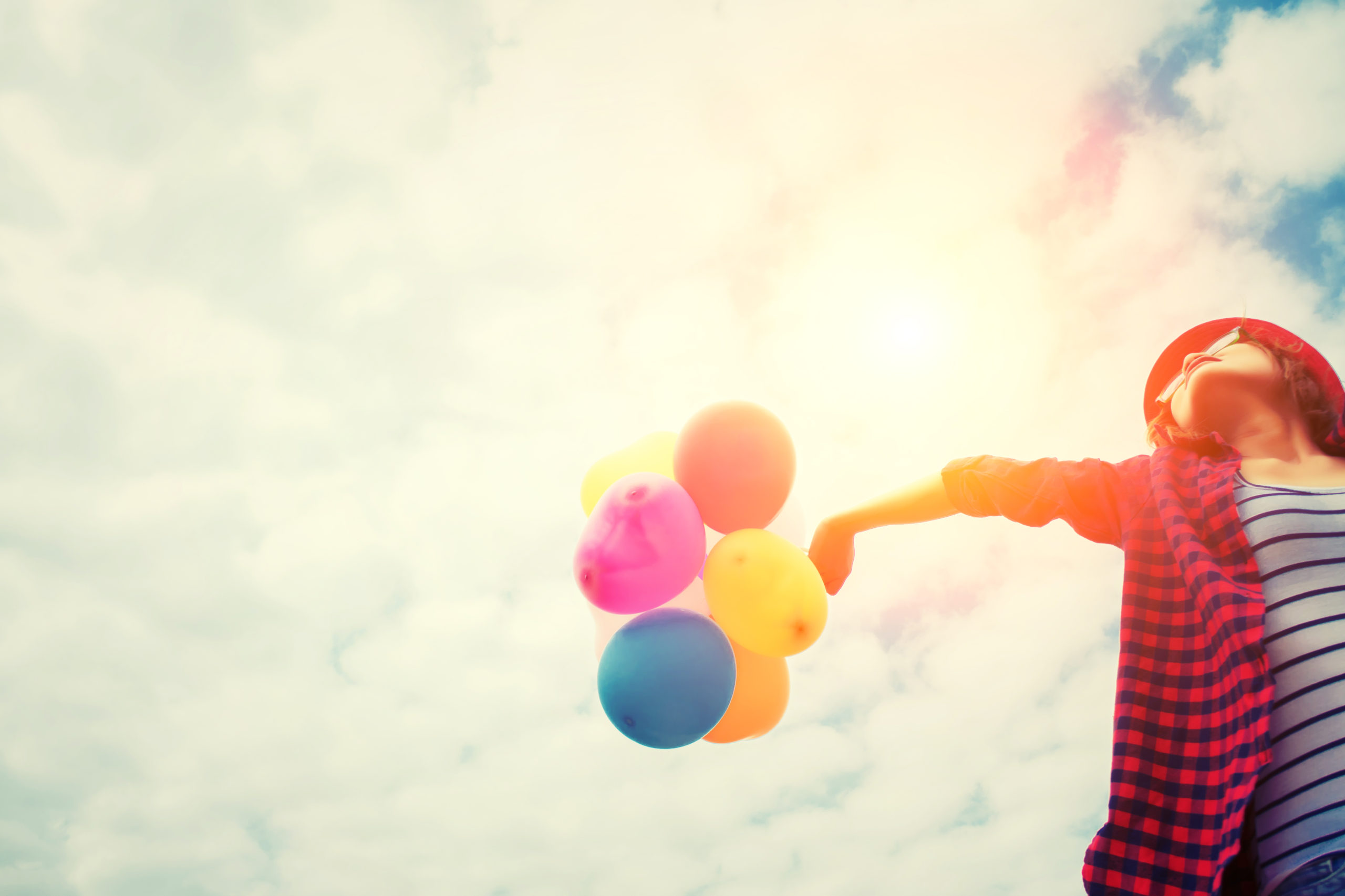 young beautiful woman holding balloon very happy on the fresh ai